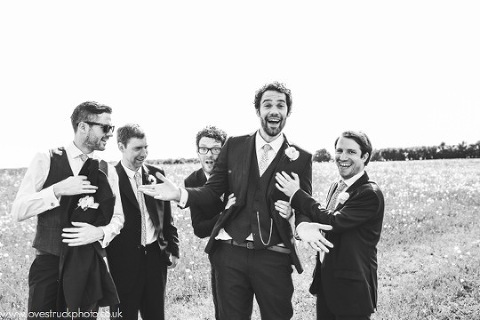 quirky wedding photos, cripps barn wedding, wedding groomsmen shots